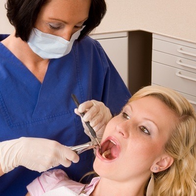 young woman having dental work done